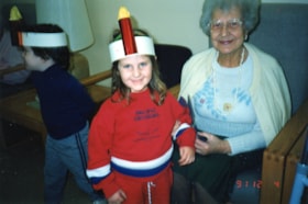 3 photographs of the Jewish Community Centre day care tots celebrating Chanukah at Hillel Lodge