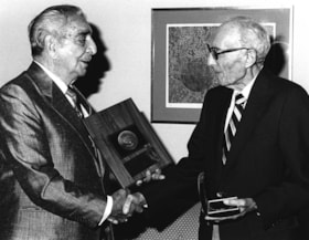 STEINER, Harry/receiving Samuel Bronfman medal from M. ABBEY