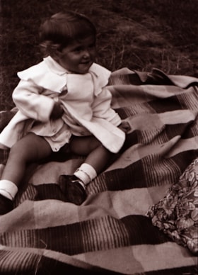 Alenka Pekova sitting on a blanket