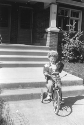 Gordon Allice on a tricycle