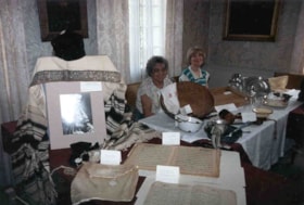 Gert Ages and Anita Rappaport watching the artifacts at the Billings Estate exhibit.