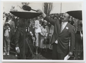 Moshe Zeig? lighting a flare at the Yom ha' shoah Holocaust Memorial dedication
