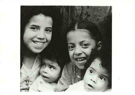 Group portrait of four children, Algeria.