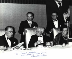 David BEN GURION, Senator Paul MARTIN at a banquet. The photo is signed P. Martin to S. HAYES