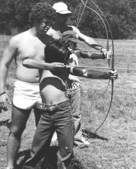 Campers at B'nai B'rith summer camp practicing archery