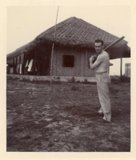 J. Nugent stands with a baseball bat