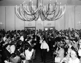 A group of children carrying candles towards the stage of the Jewish Community Centre on 151 Chapel Street in Ottawa to mark the 20th anniversary of the state of Israel