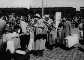 Immigrants-5000th DP to Canada/ train, Germany.