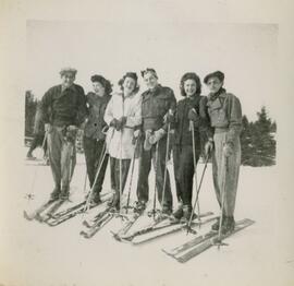 Exterior snapshot of group skiing.