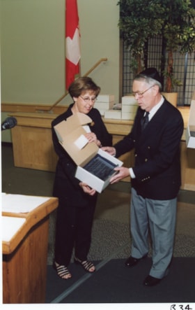 Norman Lesh with an unidentified woman at an Ottawa Jewish Community Foundation event