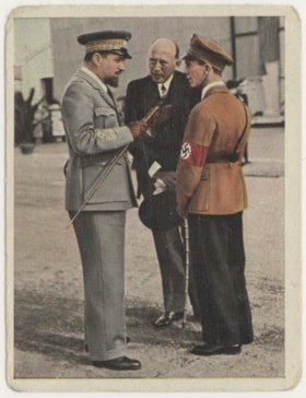 Dr. Goebbels im Gespräch mit Marschall Balbo und dem deutschen Botschaftsrat Smend auf dem romischen Flugplatz (Dr. Goebbels in conversation with Marshal Balbo and the German embassy counselor Smend at the Roman airport)