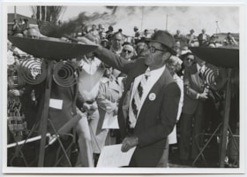 David Apowitzer lighting a flare at the Yom ha'shoah Holocaust memorial dedication