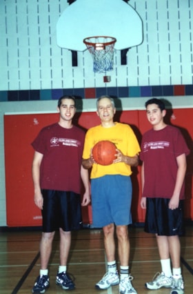 6 photos of the 2002 basketball camp and 2003 men's softball team