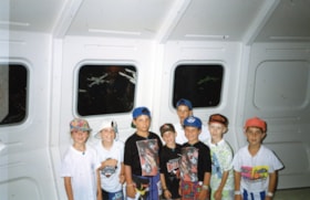 1 photo of a group of kids at a Star Wars event