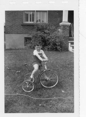 Gordon Allice on a tricycle