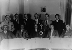 Nazi group with fascist trophy (?) no identification
