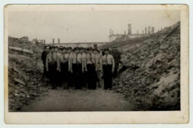 Bundist self-defense group on ruins of Warsaw Ghetto