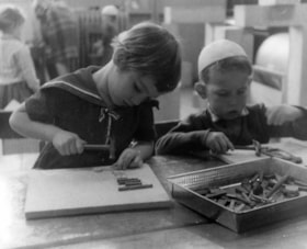 Two Hillel Academy kindergarten students at play.