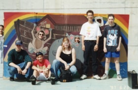 Group of teenagers in front of a Noah's Ark painting