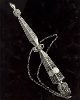 Photograph showing a silver Yad (pointer). Legible date of donation on the Yad is 6th Sabbath 5616.