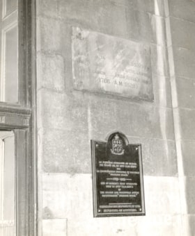 Photographs and photographed documents re: the Stanley Street Synagogue cornerstone, including handwritten notes in Hebrew and English saying that the synagogue cornerstone was laid by Gershon Joseph, Esq., on September 22, 1887; photographs of different coins and items placed in the cornerstone.