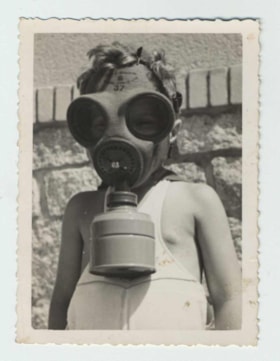 Milan Voticky wearing gas mask