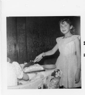 Beverly Allice cutting birthday cake