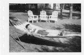 Gordon Allice in a hammock at Lake George