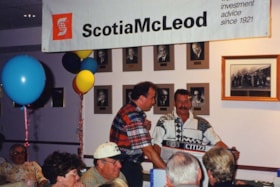 Charles Schachnow and an unidentified individual at the 5th Annual United Jewish Appeal Golf Tournament