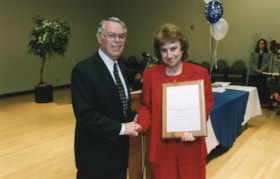 Norman Lesh and an unidentified woman at an Ottawa Jewish Community Foundation award ceremony.