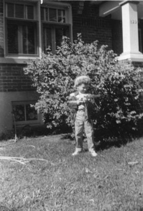 Gordon Allice holding a fake gun