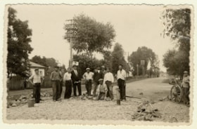 Men building a road