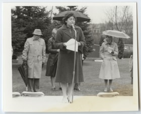 Unidentified woman speaking at Holocaust Memorial