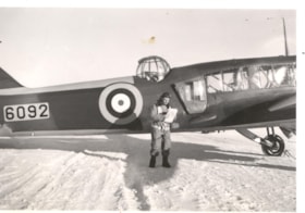 Flight Lieutenant Jack Arron in front of plane.