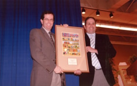 Roger Greenberg (left) as the Gilbert Greenberg Award recipient for distinguished service.