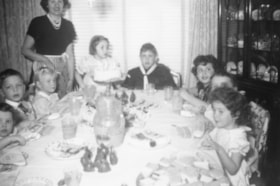 Kids sitting around a table