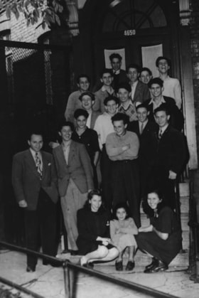 War Orphans at door of Herzl Dispensary, Jeanne Mance St., Montreal, Joe Kage at left