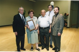 Malka and Shmuel Feig with sons-in-law, Leslie Breiner and Barry Farber, receive plaque for the Shmuel and Malka Feig Endowment Fund.