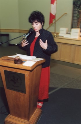 Unidentified woman giving a speech at an Ottawa Jewish Community Foundation annual general meeting.