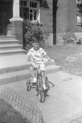 Murray Allice on a tricycle