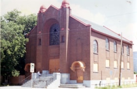 Exterior of Machzikei Hadas Synagogue. Rocks and beebee guns were shot through the windows before it was demolished, damaging zodiac murals inside.