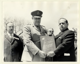 Presentation of plaque to General Allard at Holocaust rally in Montreal