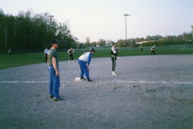 Unidentified men on a baseball field