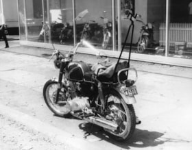 Swastika on motorcycle/seen on St. Urbain Street, Montreal. Includes accompanying documentation