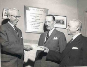 David Epstein presenting a cheque to Trevor Moore and Magistrate Glenn Strike of the Ottawa Boys Club.