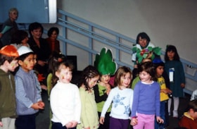 Two photographs of the Ganon Preschool celebrating Tub'shuvat.