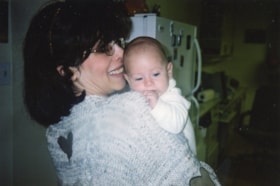 Leah Bulka holding a baby