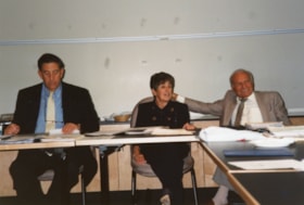 Rose Taylor, Saul Goldfarb and an unidentified man at a table