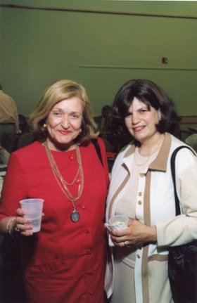 Unidentified woman with Dvorah Caittak (?) at an Ottawa Jewish Community Foundation annual general meeting.