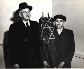 ROBINSON, Benjamin, including a photo of Robinson accepting the presentation of a Torah scroll to Canadian Jewish Congress by a German war orphan. The cover of this Torah scroll was manufactured in a DP camp.